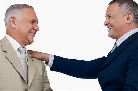 simsearch:625-02929907,k - Close-up of two businessmen smiling Stock Photo - Premium Royalty-Free, Code: 625-02930012