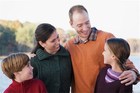 Close-up of a family smiling Stock Photo - Premium Royalty-Free, Code: 625-02930067