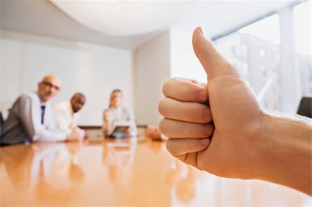 Person's hand showing thumbs up gesture Stock Photo - Premium Royalty-Free, Code: 625-02930149