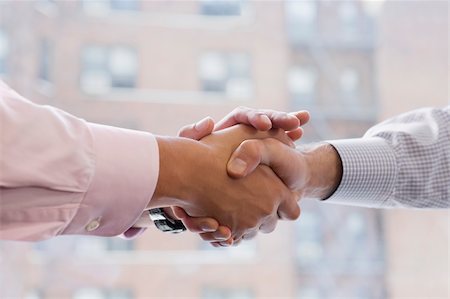 Close-up of two businessmen shaking hands Foto de stock - Sin royalties Premium, Código: 625-02930174