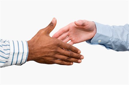 finger white background - Close-up of two businessmen's shaking hands Stock Photo - Premium Royalty-Free, Code: 625-02930189