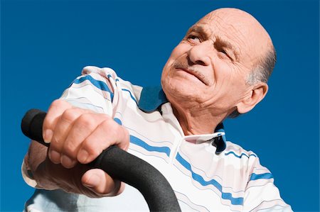 simsearch:625-01095436,k - Close-up of a senior man on a bicycle Stock Photo - Premium Royalty-Free, Code: 625-02930999