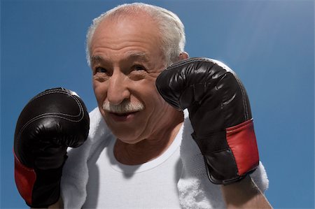 recreational sports elderly - Close-up of a senior man in boxing pose Stock Photo - Premium Royalty-Free, Code: 625-02931009