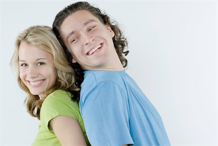 Close-up of a young couple smiling Stock Photo - Premium Royalty-Free, Code: 625-02931201