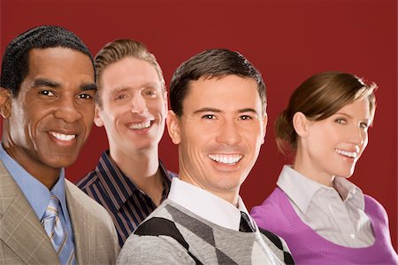 simsearch:625-02931305,k - Portrait de quatre dirigeants d'entreprise souriant Photographie de stock - Premium Libres de Droits, Code: 625-02931296
