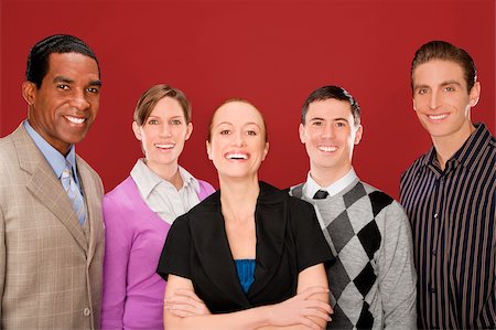 portrait of a group of clerks - Portrait of four business executives smiling Stock Photo - Premium Royalty-Free, Code: 625-02931293