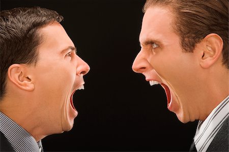 Close-up of two businessmen shouting at each other Foto de stock - Sin royalties Premium, Código: 625-02931302