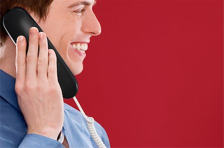 simsearch:625-02932799,k - Close-up of a businessman talking on the telephone Foto de stock - Sin royalties Premium, Código: 625-02931368