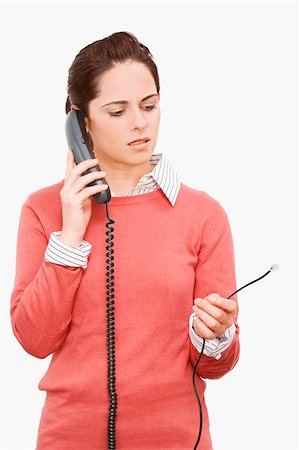 simsearch:625-02931241,k - Businesswoman talking on the phone Fotografie stock - Premium Royalty-Free, Codice: 625-02931409