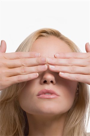 female hands covering eyes - Close-up of a young woman covering her eyes with her hands Stock Photo - Premium Royalty-Free, Code: 625-02931607