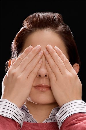 Close-up of a businesswoman covering her eyes with her hands Fotografie stock - Premium Royalty-Free, Codice: 625-02931690