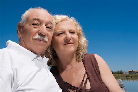 elderly european couple - Close-up of a senior couple smiling Stock Photo - Premium Royalty-Free, Code: 625-02931715
