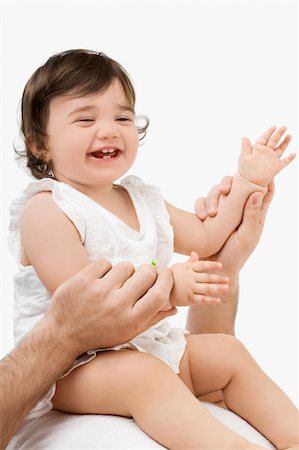 simsearch:625-02932396,k - Close-up of a girl playing with her father Foto de stock - Sin royalties Premium, Código: 625-02931758
