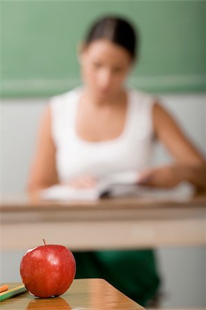 teachers desk with apple