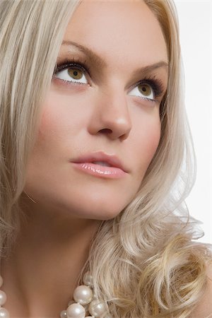 simsearch:625-02930713,k - Close-up of a young woman thinking Stock Photo - Premium Royalty-Free, Code: 625-02931942