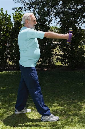 simsearch:625-02932654,k - Senior man exercising with a dumbbell Foto de stock - Royalty Free Premium, Número: 625-02932083