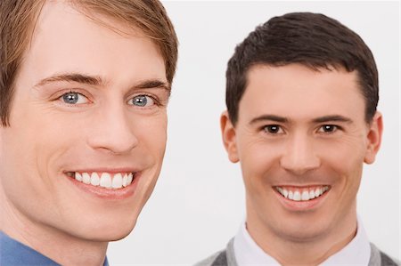 simsearch:625-02929907,k - Portrait of two businessmen smiling Stock Photo - Premium Royalty-Free, Code: 625-02932147