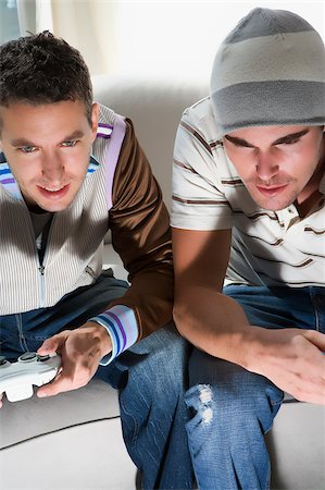 simsearch:625-02931506,k - High angle view of two young men playing video game Stock Photo - Premium Royalty-Free, Code: 625-02932262