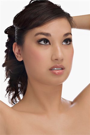 simsearch:625-02267557,k - Close-up of a young woman thinking Stock Photo - Premium Royalty-Free, Code: 625-02932376