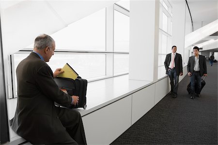 Businessmen at an airport lounge Stock Photo - Premium Royalty-Free, Code: 625-02932398