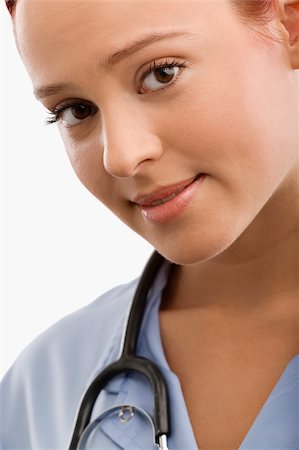 simsearch:625-02929220,k - Portrait of a female doctor smiling Stock Photo - Premium Royalty-Free, Code: 625-02932522