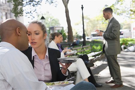 eating women expression - Businessman kissing a businesswoman Foto de stock - Sin royalties Premium, Código: 625-02932750