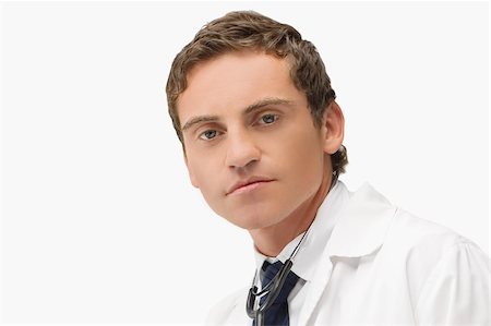 portrait medical white background not animal not smiling - Portrait of a male doctor Stock Photo - Premium Royalty-Free, Code: 625-02932772