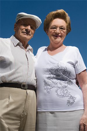 Low angle view of a senior couple smiling Stock Photo - Premium Royalty-Free, Code: 625-02932791