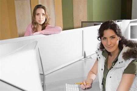 simsearch:625-02929867,k - Portrait of two young women in a computer lab Fotografie stock - Premium Royalty-Free, Codice: 625-02932846