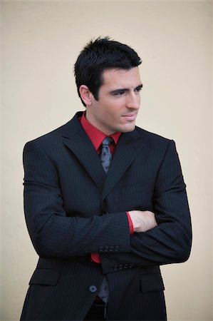 simsearch:625-02930851,k - Businessman standing with his arms crossed and smiling Stock Photo - Premium Royalty-Free, Code: 625-02932859