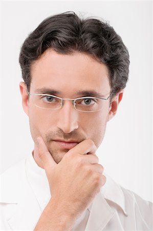 Portrait of a male doctor looking serious Stock Photo - Premium Royalty-Free, Code: 625-02933123