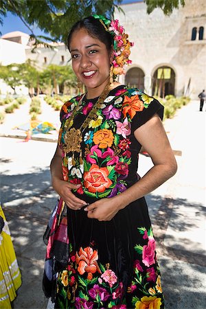 Portrait of a mid adult woman in traditional clothing, Oaxaca, Oaxaca State, Mexico Stock Photo - Premium Royalty-Free, Code: 625-02933377