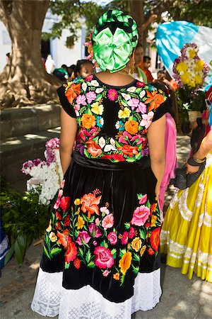 Rear view of a woman standing in wedding ceremony, Oaxaca, Oaxaca State, Mexico Stock Photo - Premium Royalty-Free, Code: 625-02933386