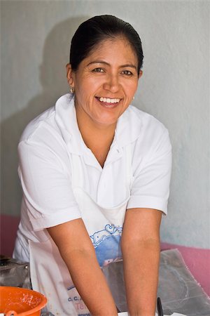simsearch:625-02929083,k - Portrait of a mature woman in a domestic kitchen, Real De Asientos, Aguascalientes, Mexico Stock Photo - Premium Royalty-Free, Code: 625-02933381