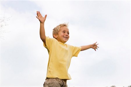 simsearch:628-07072134,k - Happy boy with outstretched arms, Munich, Bavaria, Germany Foto de stock - Royalty Free Premium, Número: 628-05817205