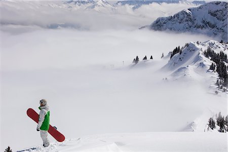 standing on snowboarding - Snowboarder standing on Hahnenkamm, Tyrol, Austria Foto de stock - Sin royalties Premium, Código: 628-05817224