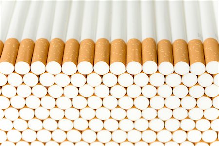 Pile of cigarettes Stock Photo - Premium Royalty-Free, Code: 628-05817365