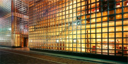House made of glass bricks, illuminated Stock Photo - Premium Royalty-Free, Code: 628-05817402