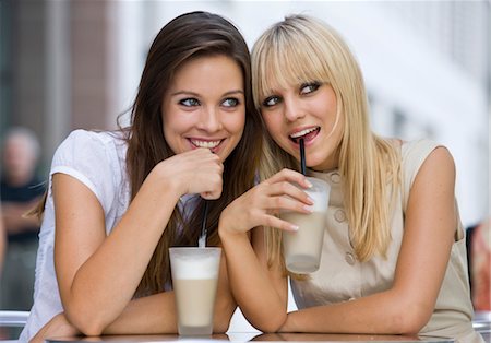 food friends outside - Two happy women at outdoor cafe looking around Stock Photo - Premium Royalty-Free, Code: 628-05817738