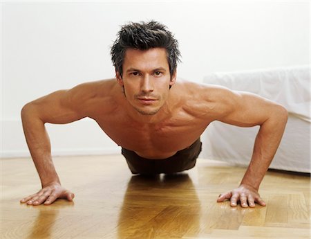 pretty - Man doing push-ups Stock Photo - Premium Royalty-Free, Code: 628-05817733