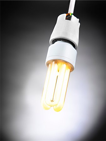 Illuminated energy saving bulb Foto de stock - Sin royalties Premium, Código: 628-05817927