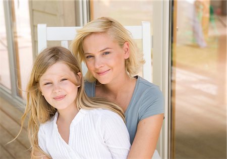 Mother and daughter on terrace, Augsburg, Bavaria, Germany Stock Photo - Premium Royalty-Free, Code: 628-05817947