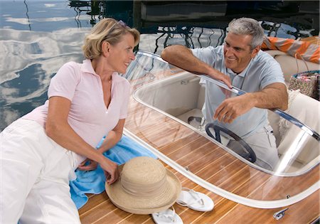 Mature couple on a boat, Starnberg, Bavaria, Germany Foto de stock - Sin royalties Premium, Código: 628-05817997