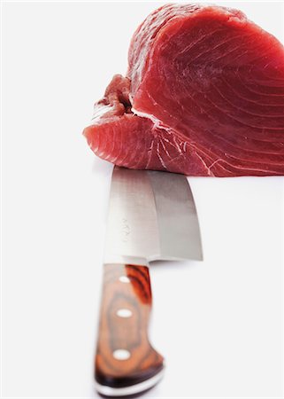 Tuna fillet and Knife, close-up Foto de stock - Sin royalties Premium, Código: 628-05818005