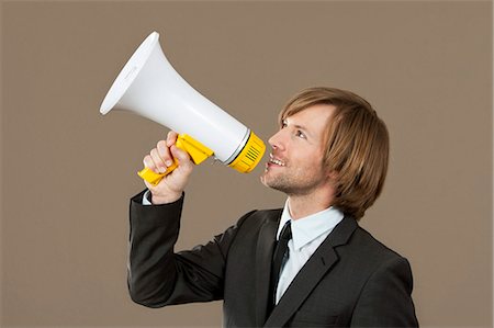 simsearch:628-07072222,k - Businessman holding megaphone Stockbilder - Premium RF Lizenzfrei, Bildnummer: 628-07072195