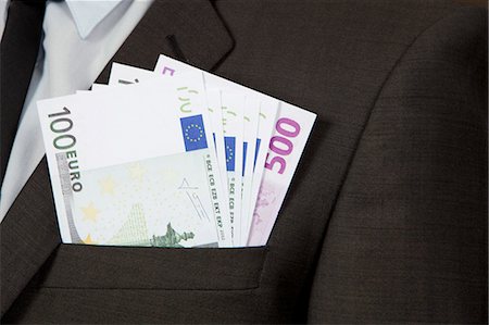 Jacket pocket with Euro notes Stock Photo - Premium Royalty-Free, Code: 628-07072190