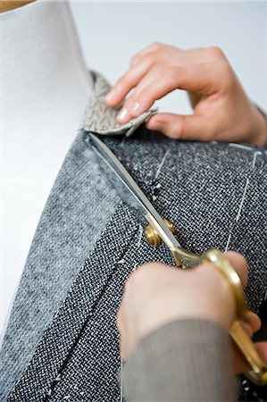 suits alteration - Tailoress in studio at work Photographie de stock - Premium Libres de Droits, Code: 628-07072382