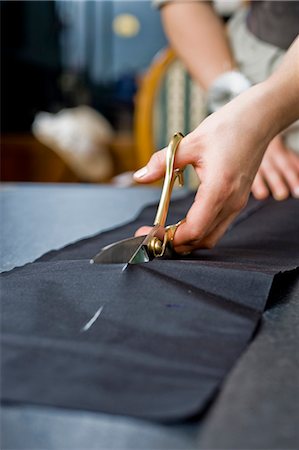 studio fabric - Tailoress with scissors at work Stock Photo - Premium Royalty-Free, Code: 628-07072412