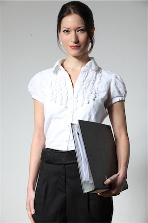 Businesswoman holding folder Stockbilder - Premium RF Lizenzfrei, Bildnummer: 628-07072429