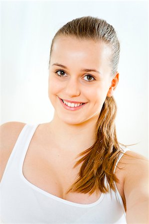 Smiling teenage girl Stock Photo - Premium Royalty-Free, Code: 628-07072483